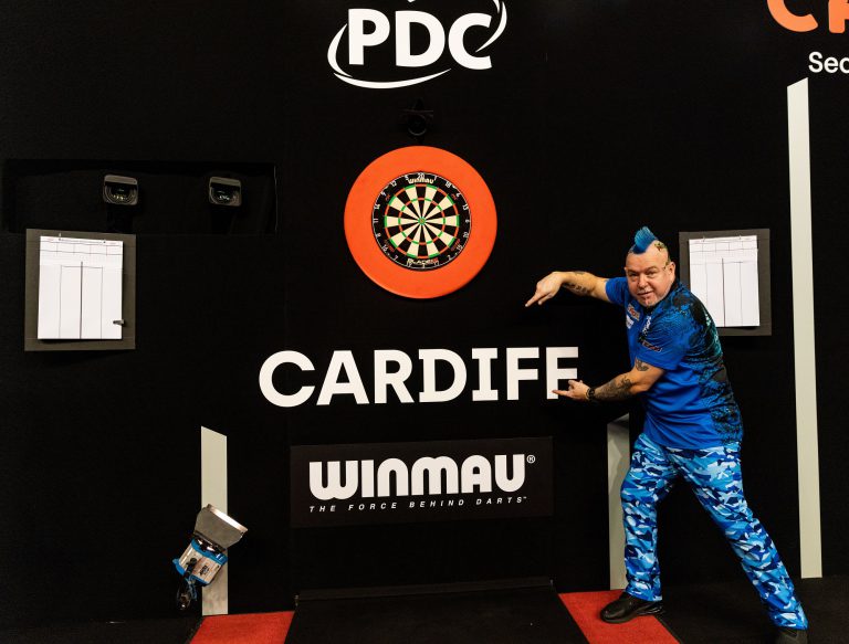 Wright makes intentions clear. World Champ wins Premier League opener