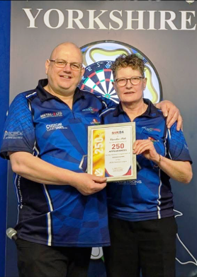 Caroline-Pike-being-presented-with-her-Certificate-for-250-appearances-for-Warwickshire-by-County-Chairman-Neil-Pritchard