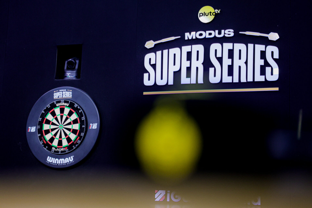 MODUS Super Series, Set-Up Graphic , Including: Winmau Darts Board and Pluto Tv logo